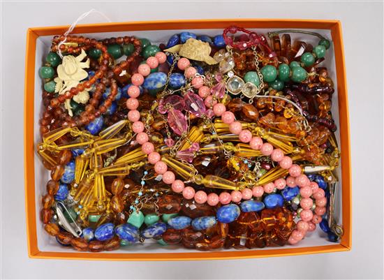 Assorted necklaces including amber with yellow metal clasp.